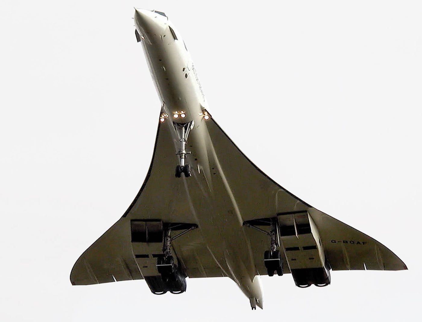 British Airways Concorde G-BOAF seen directly from below with its landing gear down, its delta wing filling the frame.